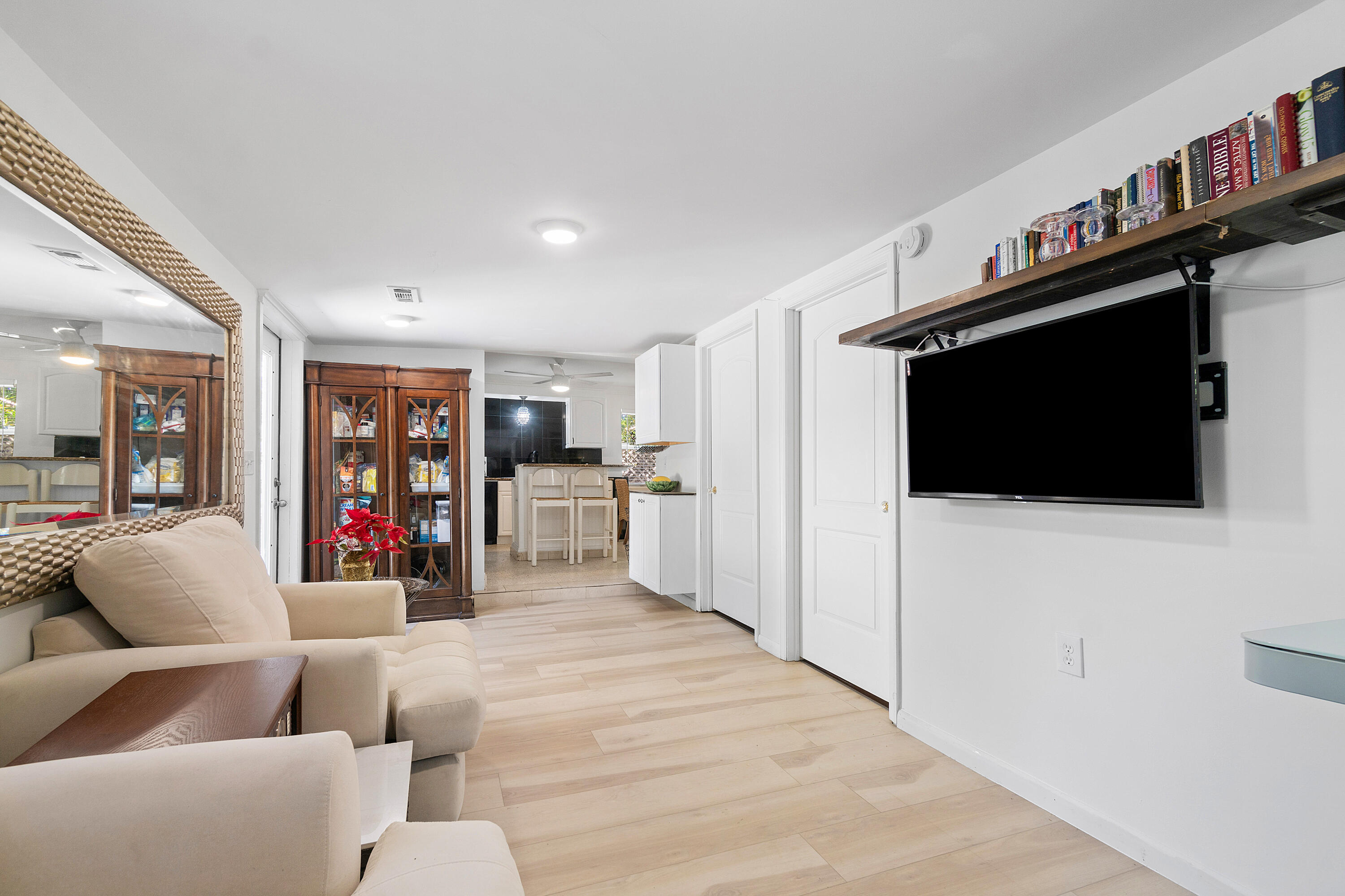 321 Forsyth Street Boca Raton, FL 33487 - Photo 15 of 20 a living room with furniture and a flat screen tv