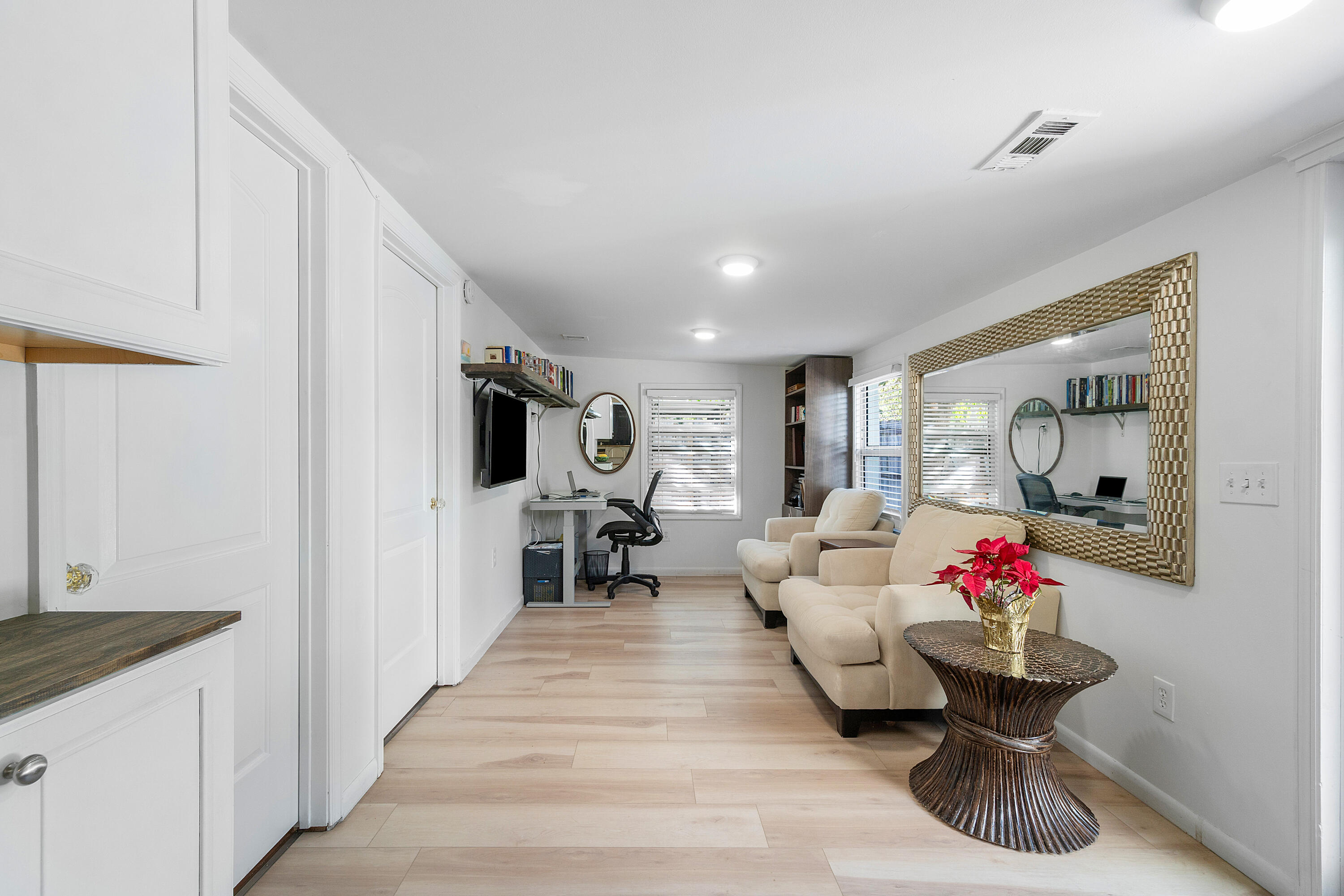 321 Forsyth Street Boca Raton, FL 33487 - Photo 16 of 20 a living room with furniture and a flat screen tv