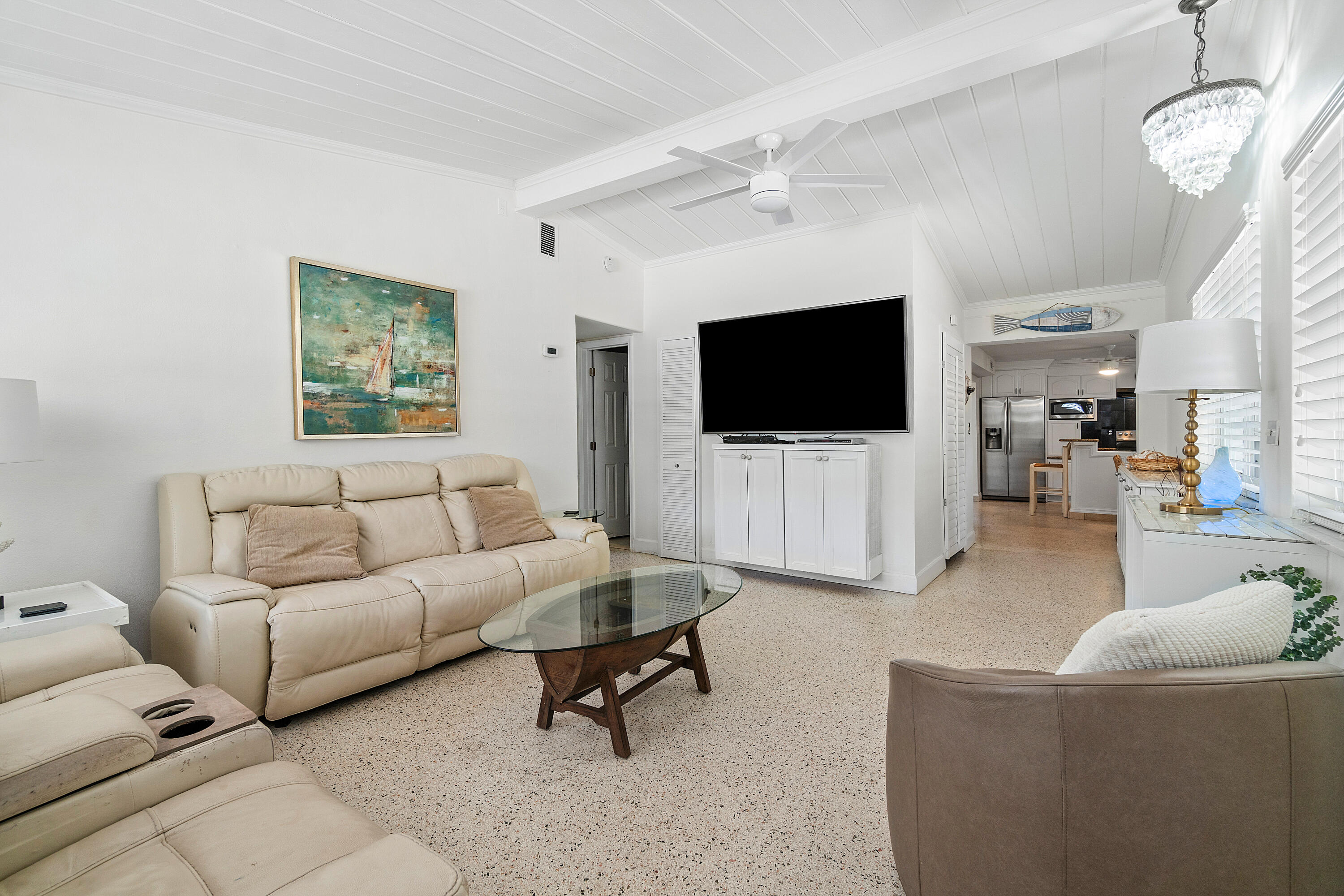 321 Forsyth Street Boca Raton, FL 33487 - Photo 3 of 20 a living room with furniture and a flat screen tv