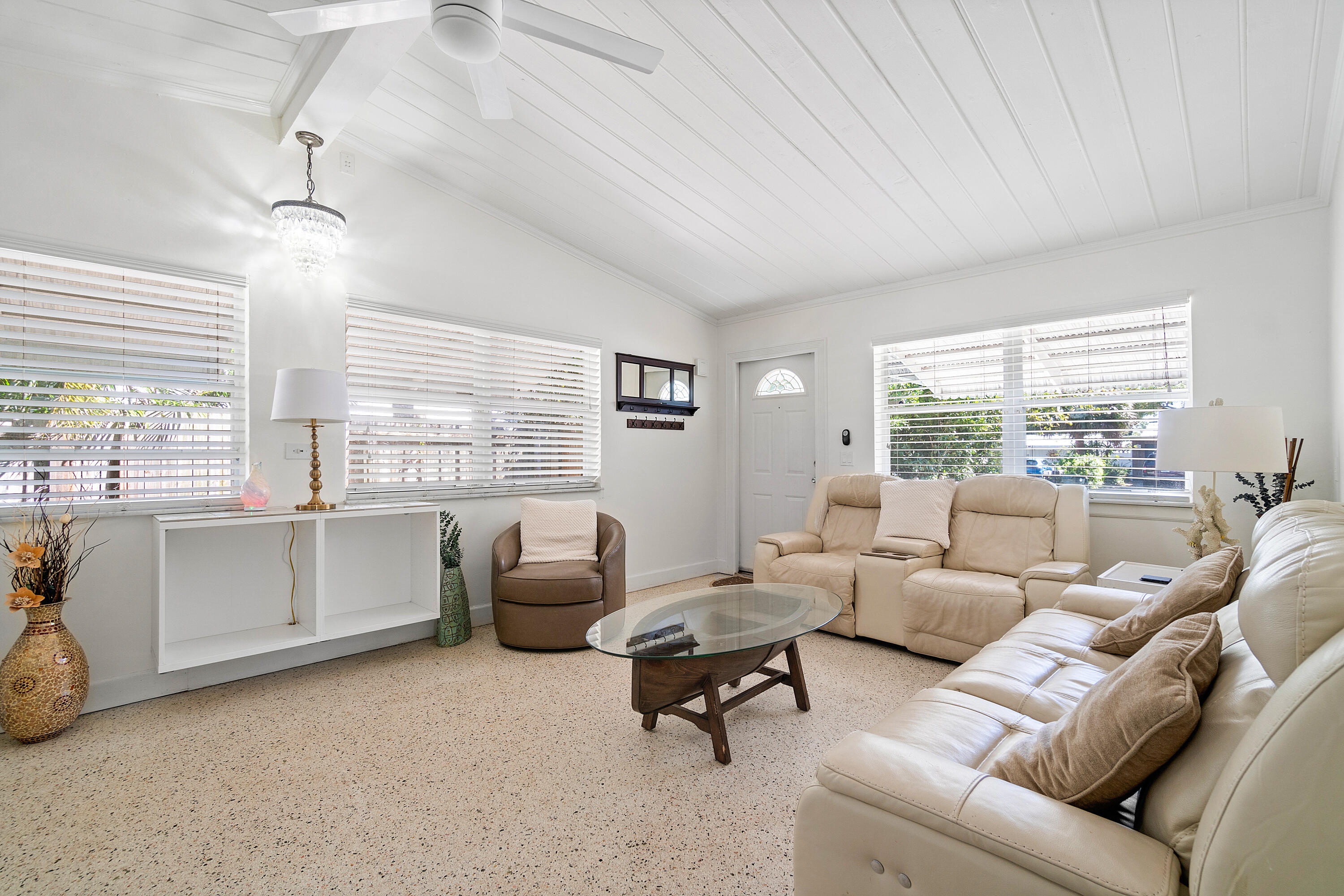 321 Forsyth Street Boca Raton, FL 33487 - Photo 4 of 20 a living room with furniture and a large window