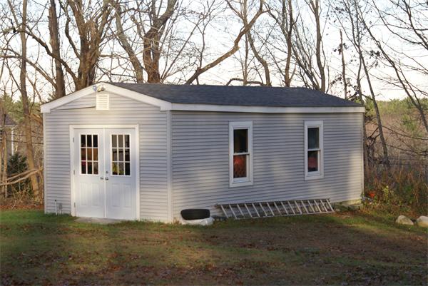 11 Mendall Road Acushnet, MA 02743 - Photo 3 of 3 a front view of a house with a yard