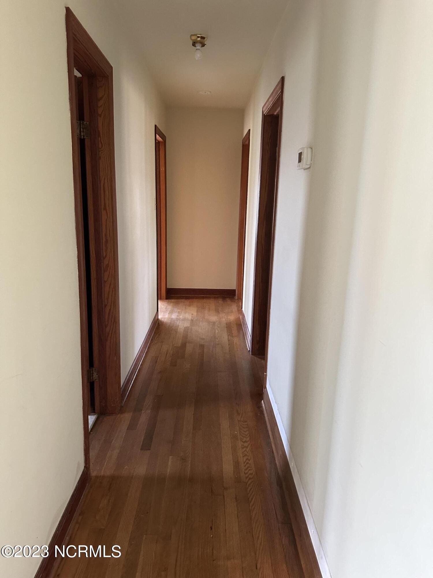 1340 Newland Road Elizabeth City, NC 27909 - Photo 13 of 23 Hall to bath & 3 bedrooms