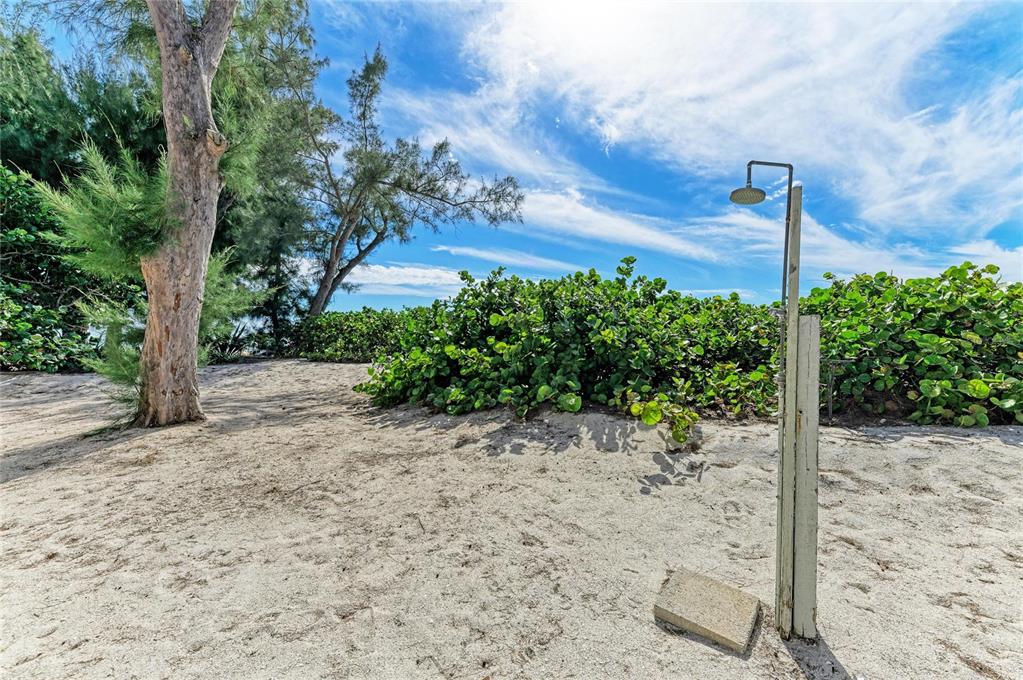 101 73rd Street, Unit 6 Holmes Beach, FL 34217 - Photo 39 of 56 a street sign on the side of a road