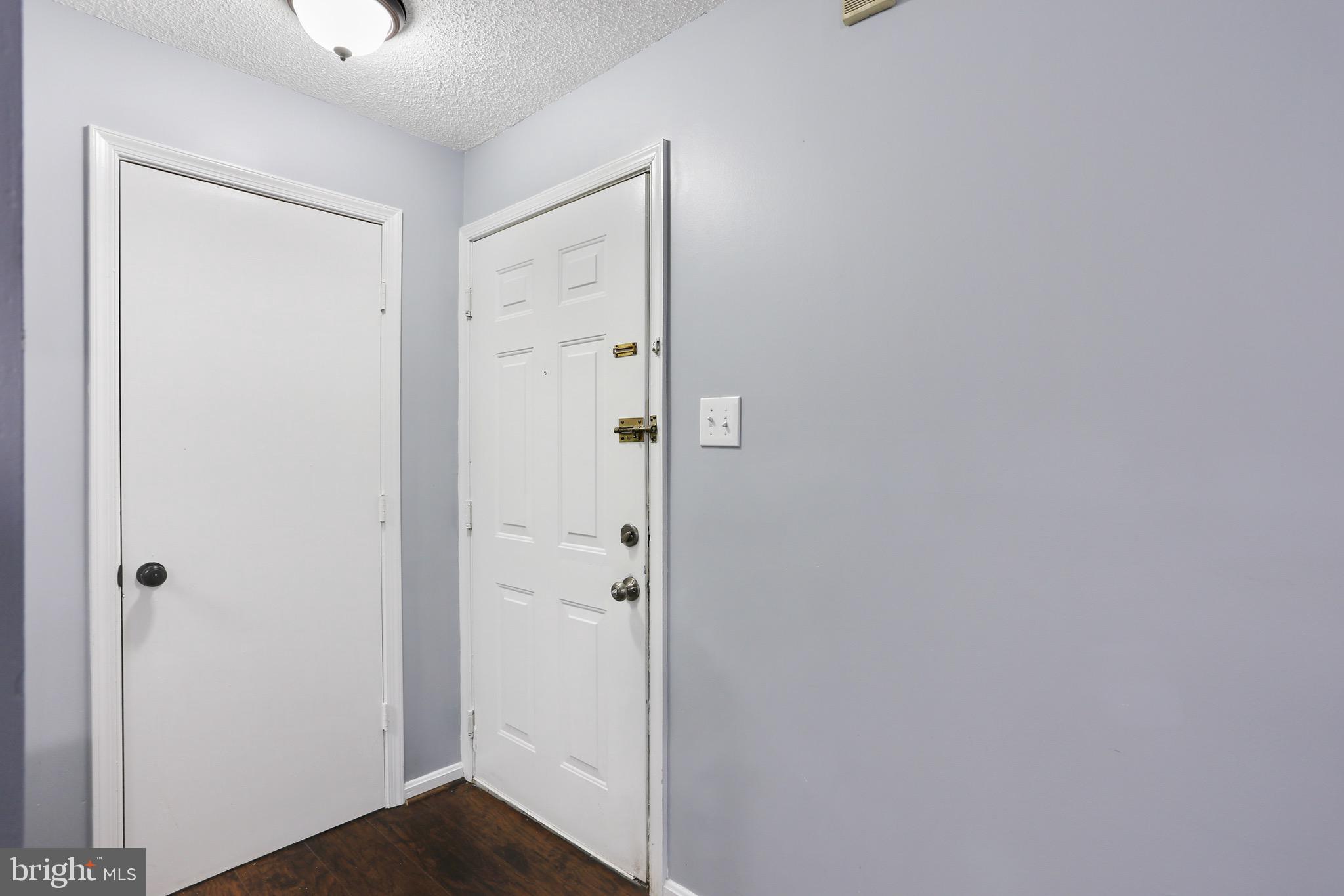 14018 Valleyfield Drive, Unit 5 Silver Spring, MD 20906 - Photo 5 of 30 Foyer | Brand New Flooring | Brand New Paint.