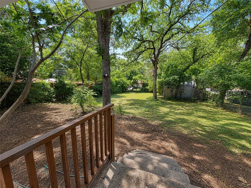 213 Wanda Way Hurst, TX 76053 - Photo 28 of 29 Large back yard with high trees providing shadow the year round