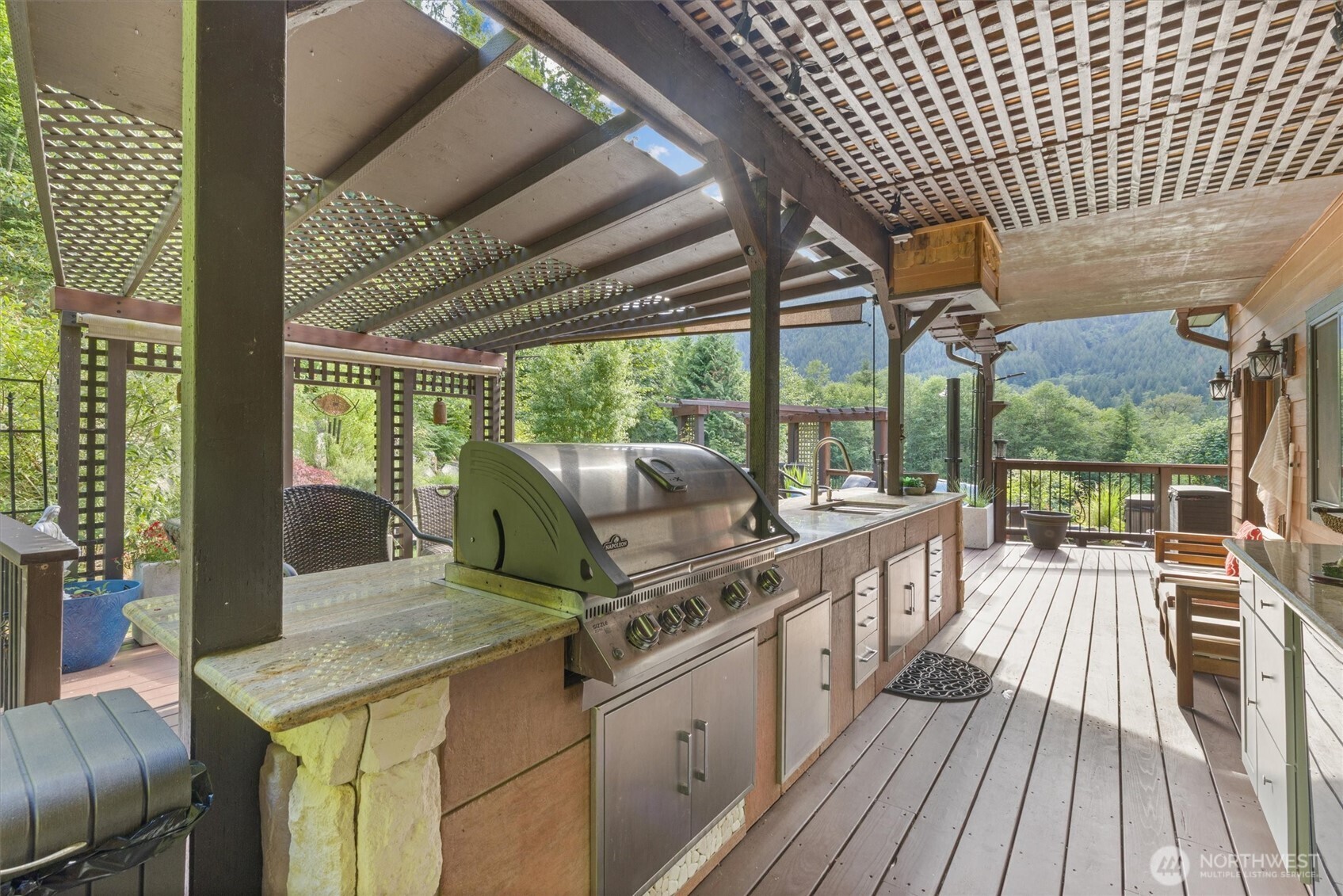 15305 Index-Galena Road Index, WA 98256 - Photo 31 of 40 a view of a patio with table and chairs