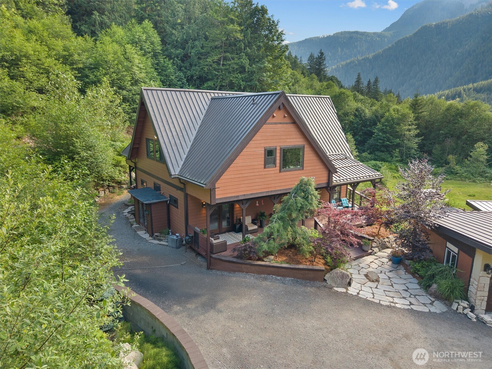 15305 Index-Galena Road Index, WA 98256 - Photo 33 of 40 a aerial view of a house with a yard and large trees
