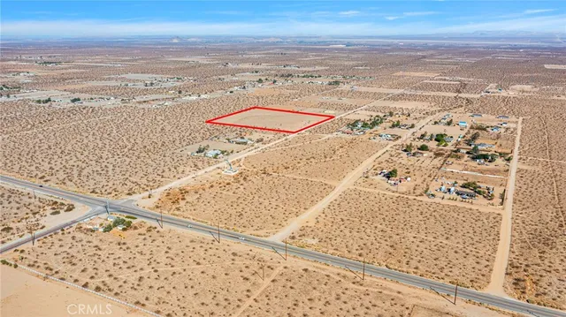 an aerial view of beach and ocean