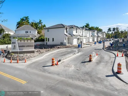 a view of a street with a building in the background