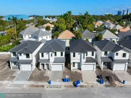 a view of a street with a houses