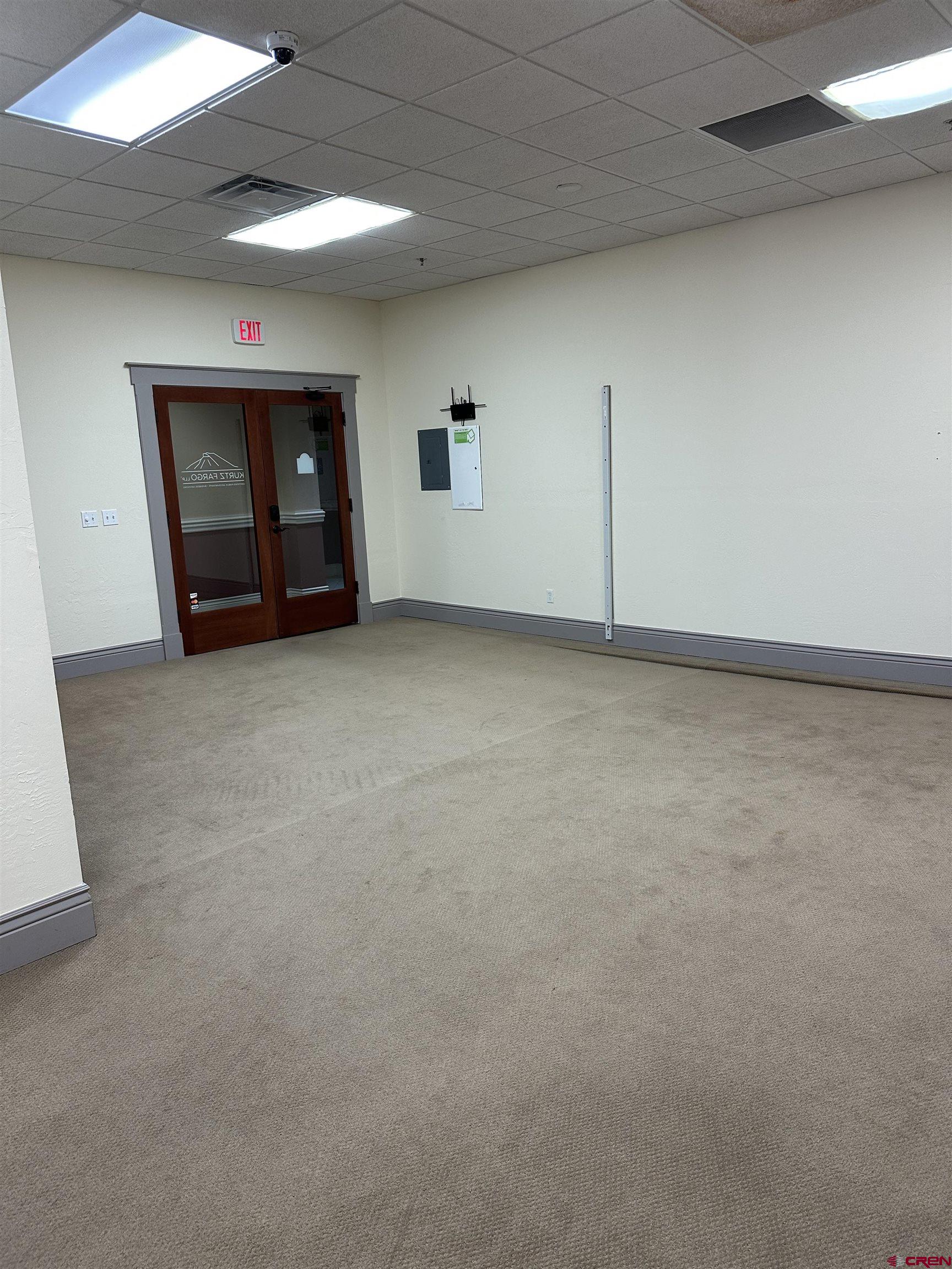 858 Main Avenue, Unit 202 Durango, CO 81301 - Photo 12 of 12 an empty room with closet and cabinet