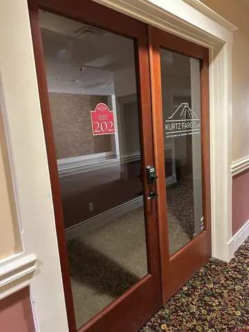 a view of empty room with a ceiling fan