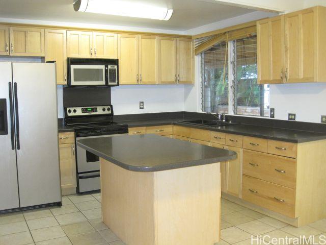 Kitchen renovated in 2008 with mable cabinets, corian counter tops and stainless steel appliances.