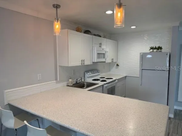 $350,000 | 4103 Gulf Boulevard, Unit 104, St. Pete Beach, FL 33706