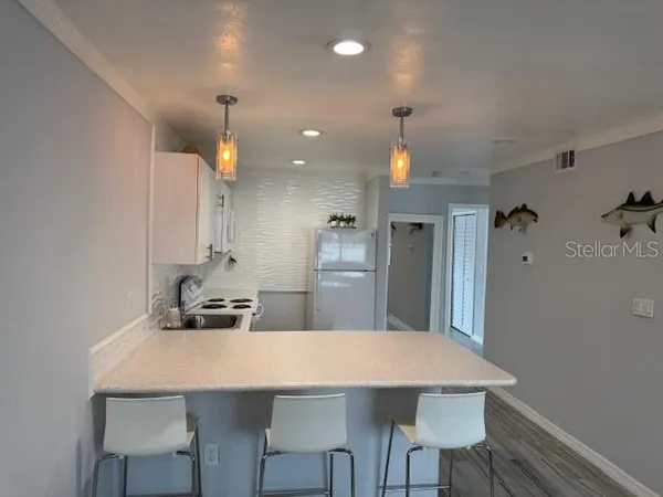 $350,000 | 4103 Gulf Boulevard, Unit 104, St. Pete Beach, FL 33706