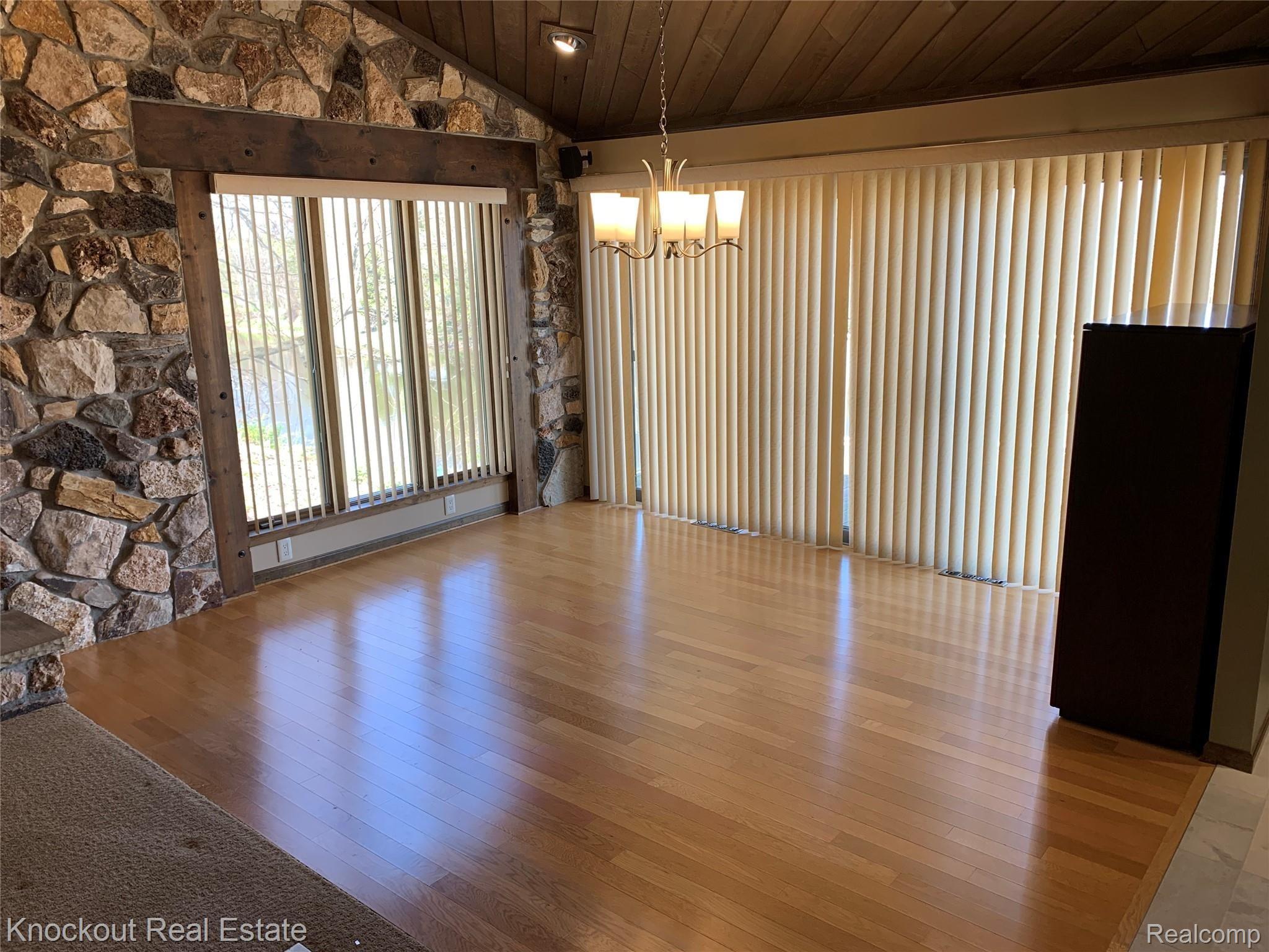 9252 Ormes Road Vassar, MI 48768 - Photo 18 of 64 Dining area graced with natural light and looks at the river