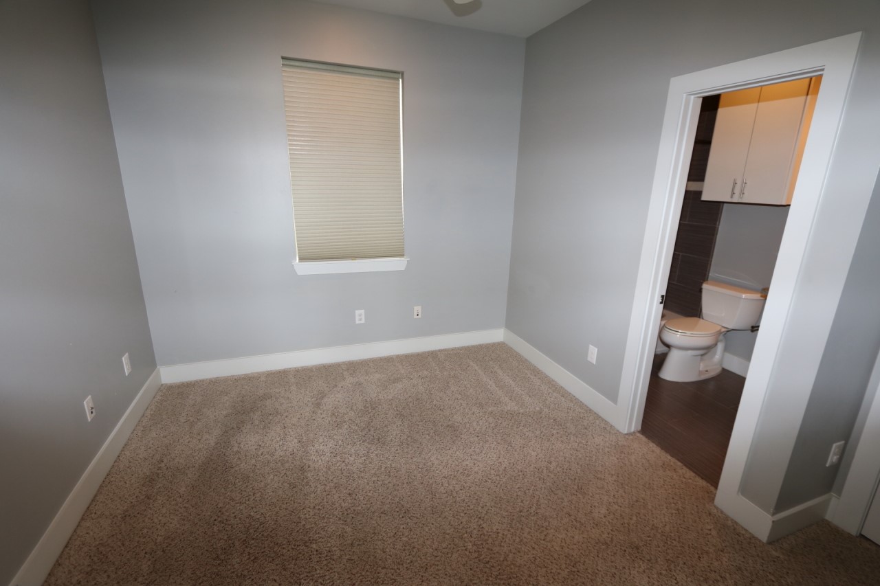 2103 Hadley Street Houston, TX 77003 - Photo 16 of 19 an empty room with a window