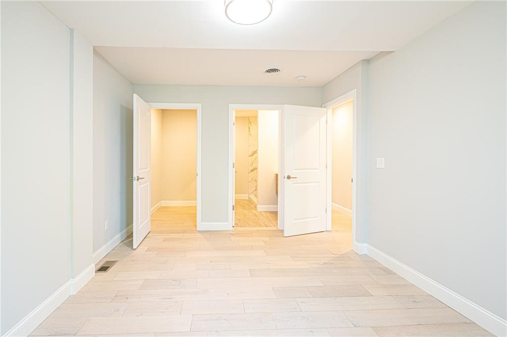 229 Chestnut Street Sewickley, PA 15143 - Photo 16 of 24 Master bedroom with walk-in closet and en suite bath.