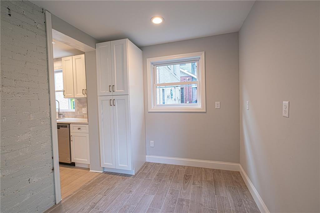 229 Chestnut Street Sewickley, PA 15143 - Photo 10 of 24 A bonus area. Leads to back yard. Could be office, laundry room anything you want!