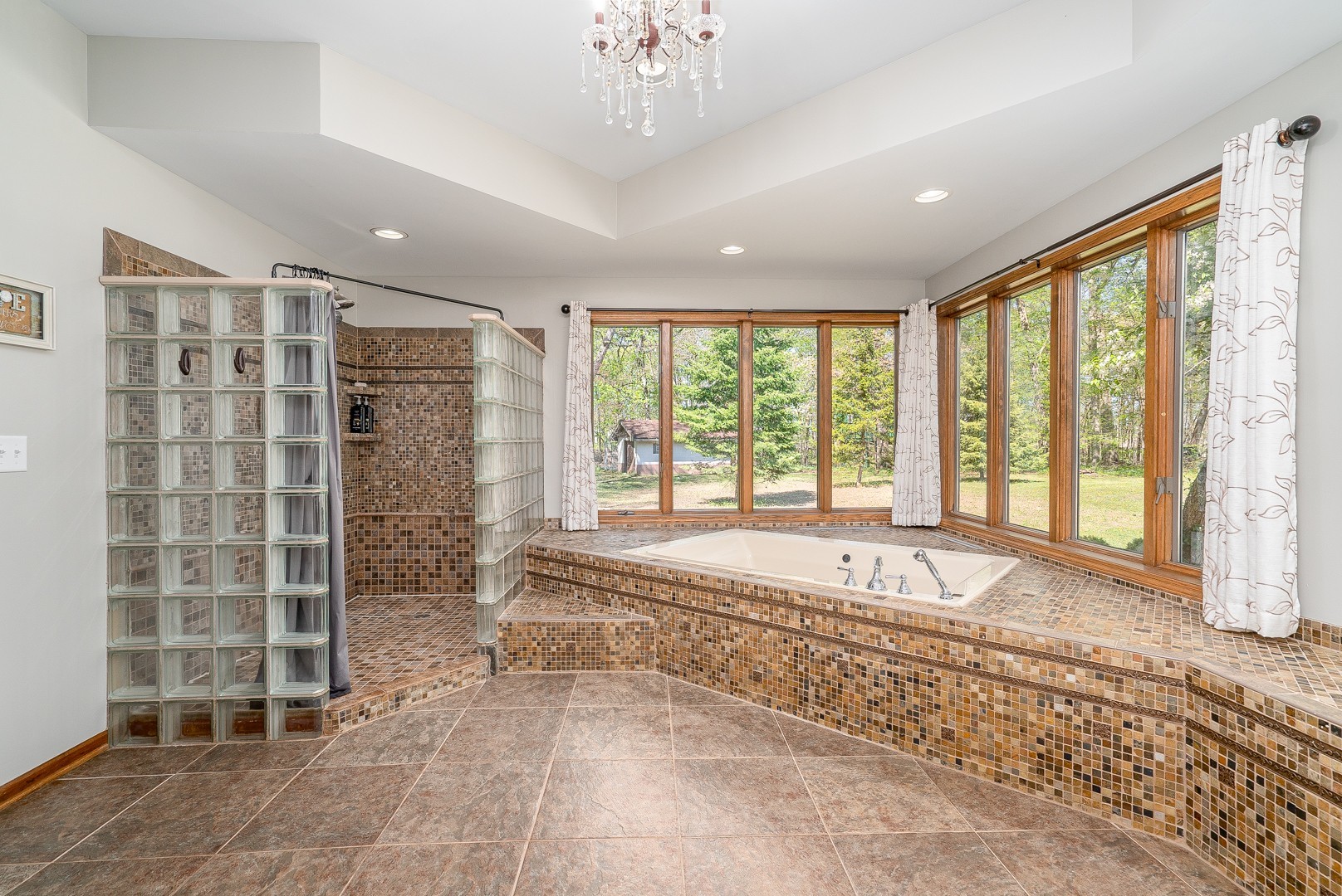8500 North 4000 W Road Morris, IL 60450 - Photo 11 of 38 a large spacious bedroom with a large bed and a window