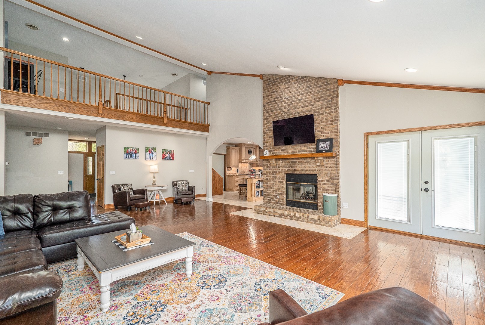 8500 North 4000 W Road Morris, IL 60450 - Photo 9 of 38 a living room with fireplace furniture and a wooden floor