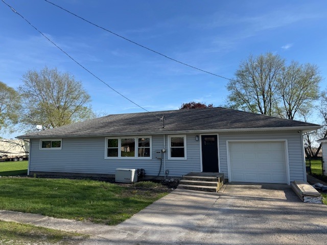 214 Lydia Street Graymont, IL 61743 - Photo 1 of 1 a front view of a house with garden