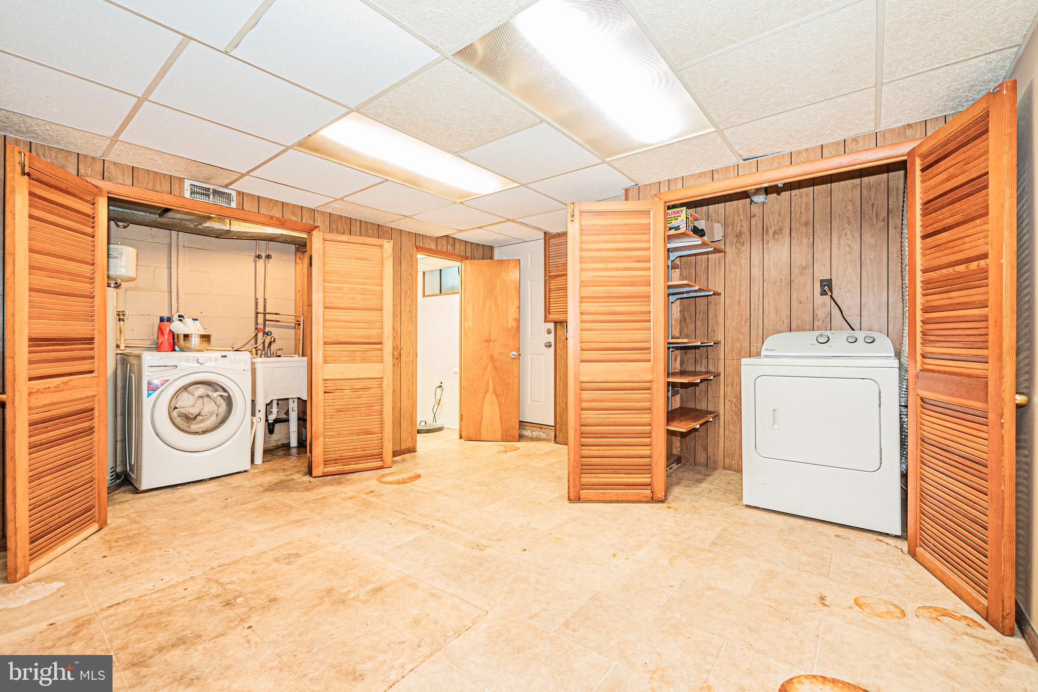 8501 Kings Ridge Road Baltimore, MD 21234 - Photo 19 of 37 a view of a storage & utility room with washer and dryer