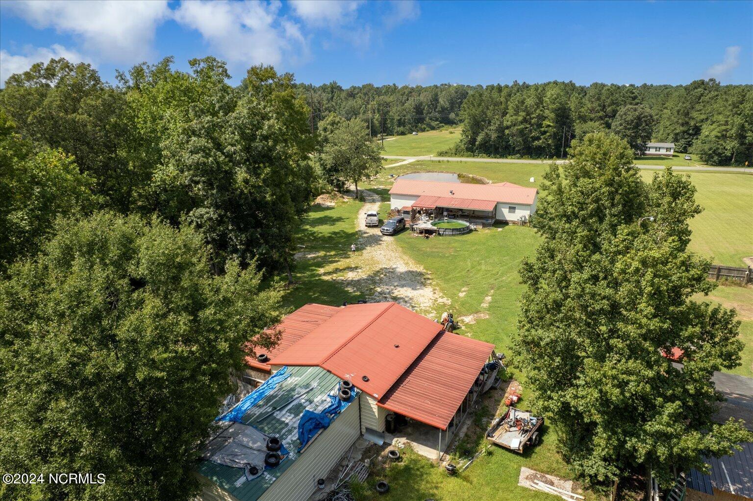 358 North Chubb Road Willard, NC 28478 - Photo 6 of 47 out bulding back of house