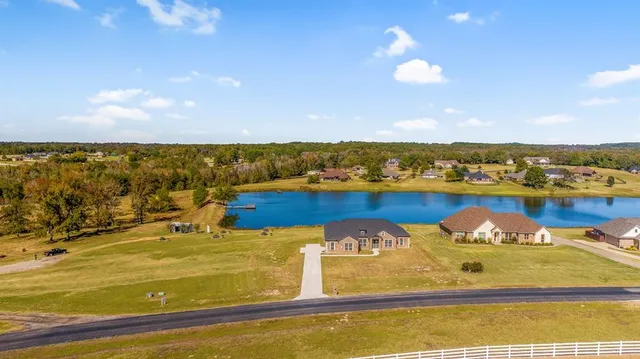 a view of a swimming pool with an ocean view