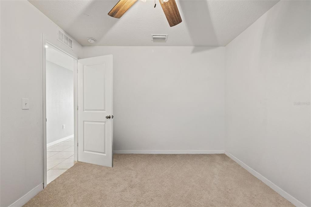 12115 Lily Magnolia Lane Riverview, FL 33569 - Photo 24 of 41 a view of an empty room