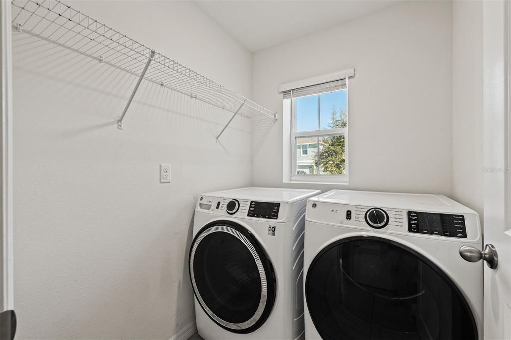 12115 Lily Magnolia Lane Riverview, FL 33569 - Photo 29 of 41 a utility room with dryer and washer