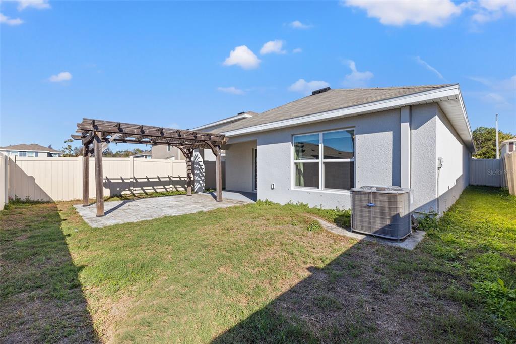 12115 Lily Magnolia Lane Riverview, FL 33569 - Photo 31 of 41 a view of a house with backyard porch and sitting area