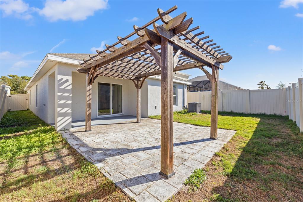 12115 Lily Magnolia Lane Riverview, FL 33569 - Photo 32 of 41 a view of a house with a yard