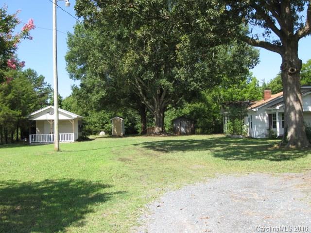622 Gay Road Monroe, NC 28112 - Photo 3 of 24 a view of a house with a yard and large trees