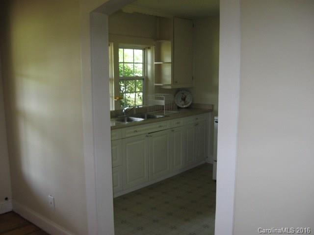 622 Gay Road Monroe, NC 28112 - Photo 22 of 24 a utility room with two sinks and a window