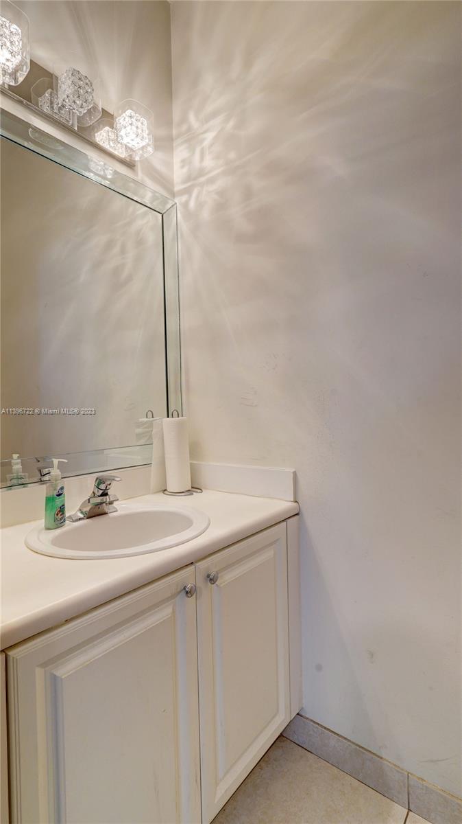 Silver Shores Miramar, FL 33027 - Photo 15 of 30 a bathroom with a sink and vanity