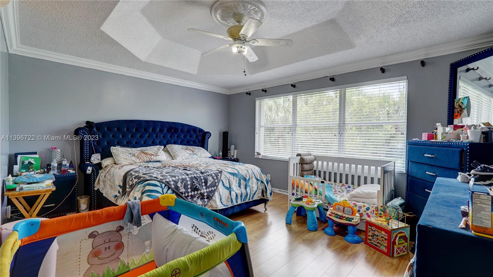 Silver Shores Miramar, FL 33027 - Photo 20 of 30 a bedroom with baby crib and a window