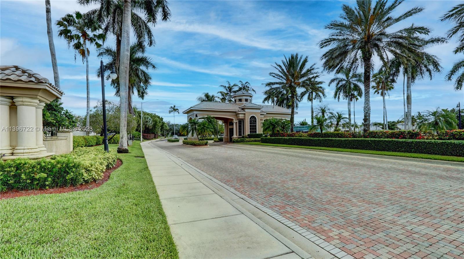 Silver Shores Miramar, FL 33027 - Photo 28 of 30 a view of a yard and palm trees