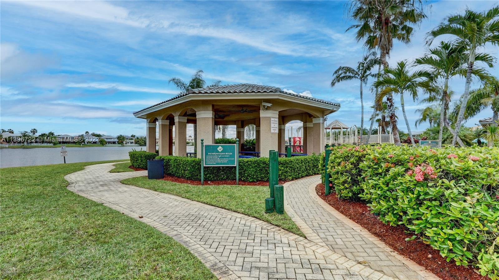 Silver Shores Miramar, FL 33027 - Photo 7 of 30 a front view of a house with garden