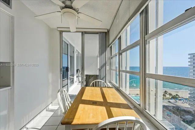 a view of a swimming pool with a balcony