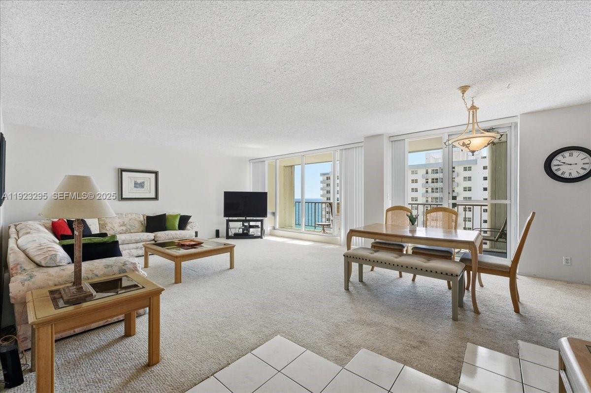 4280 Galt Ocean Drive, Unit 12H Fort Lauderdale, FL 33308 - Photo 5 of 31 a living room with furniture and a large window