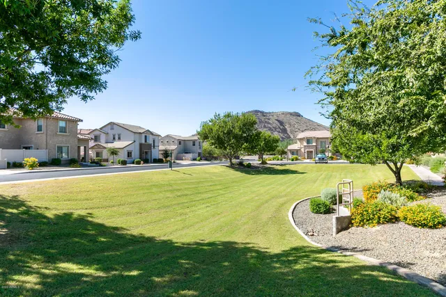 a view of a swimming pool with house