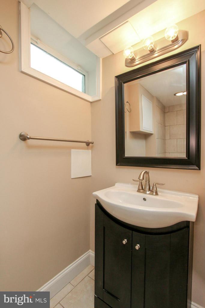 2001 Hillenwood Road Baltimore, MD 21239 - Photo 22 of 27 Updated Full Bathroom