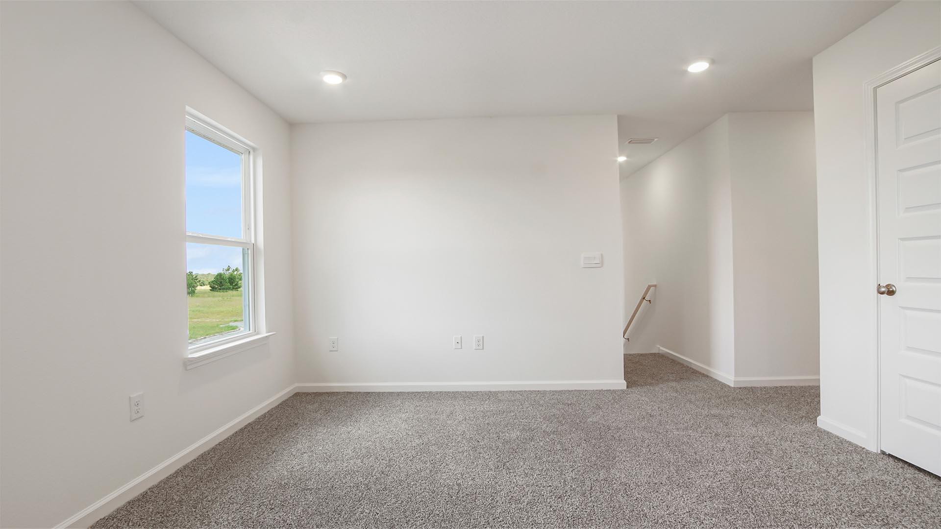 226 Huckleberry Street Freeport, FL 32439 - Photo 19 of 32 an empty room with windows