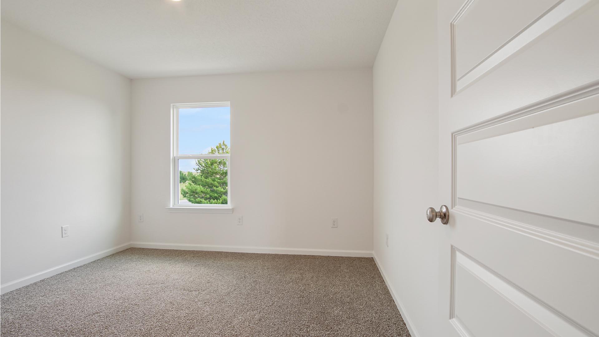 226 Huckleberry Street Freeport, FL 32439 - Photo 24 of 32 an empty room with windows