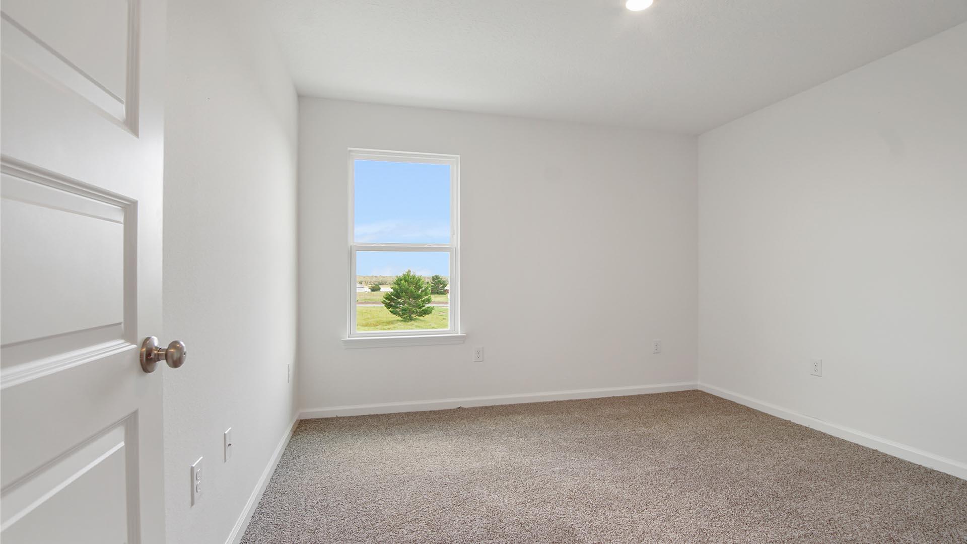 226 Huckleberry Street Freeport, FL 32439 - Photo 26 of 32 a view of an empty room with a window