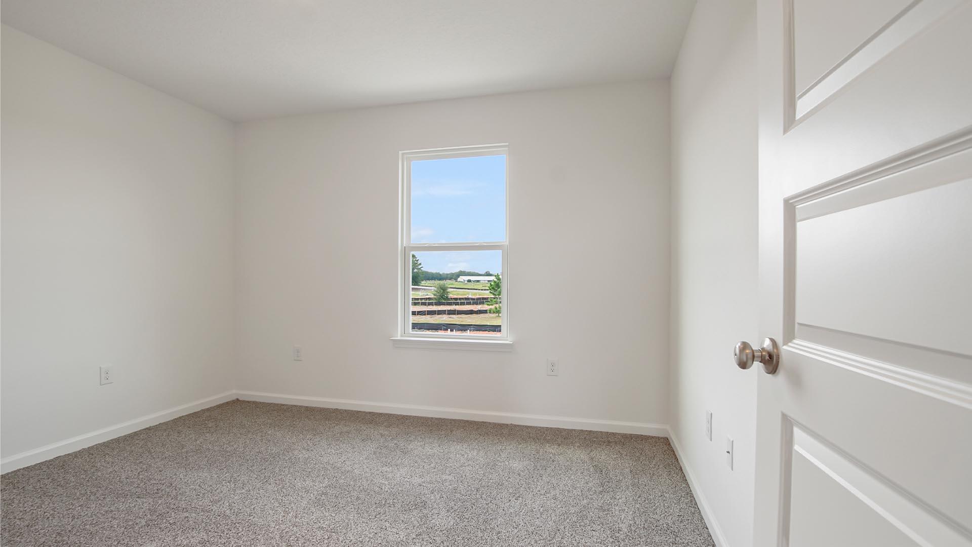 226 Huckleberry Street Freeport, FL 32439 - Photo 28 of 32 an empty room with a window