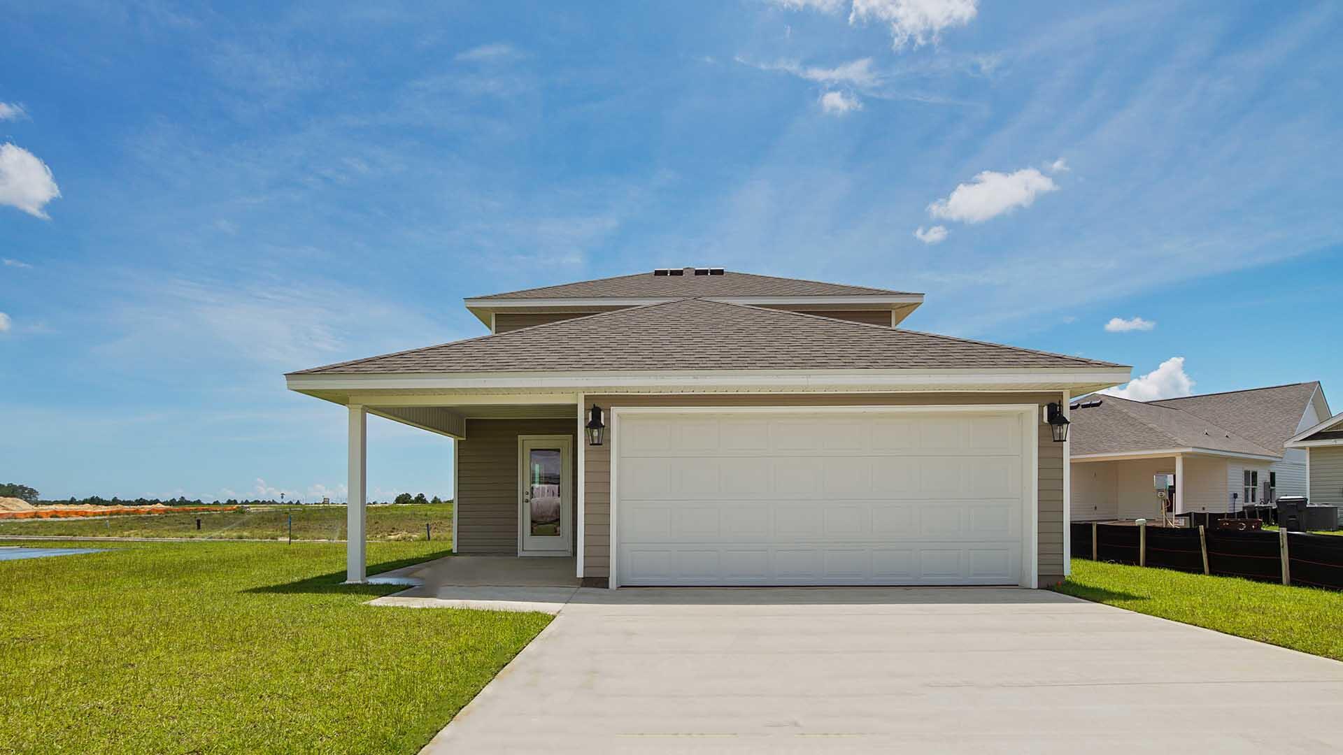 226 Huckleberry Street Freeport, FL 32439 - Photo 30 of 32 a front view of a house with yard