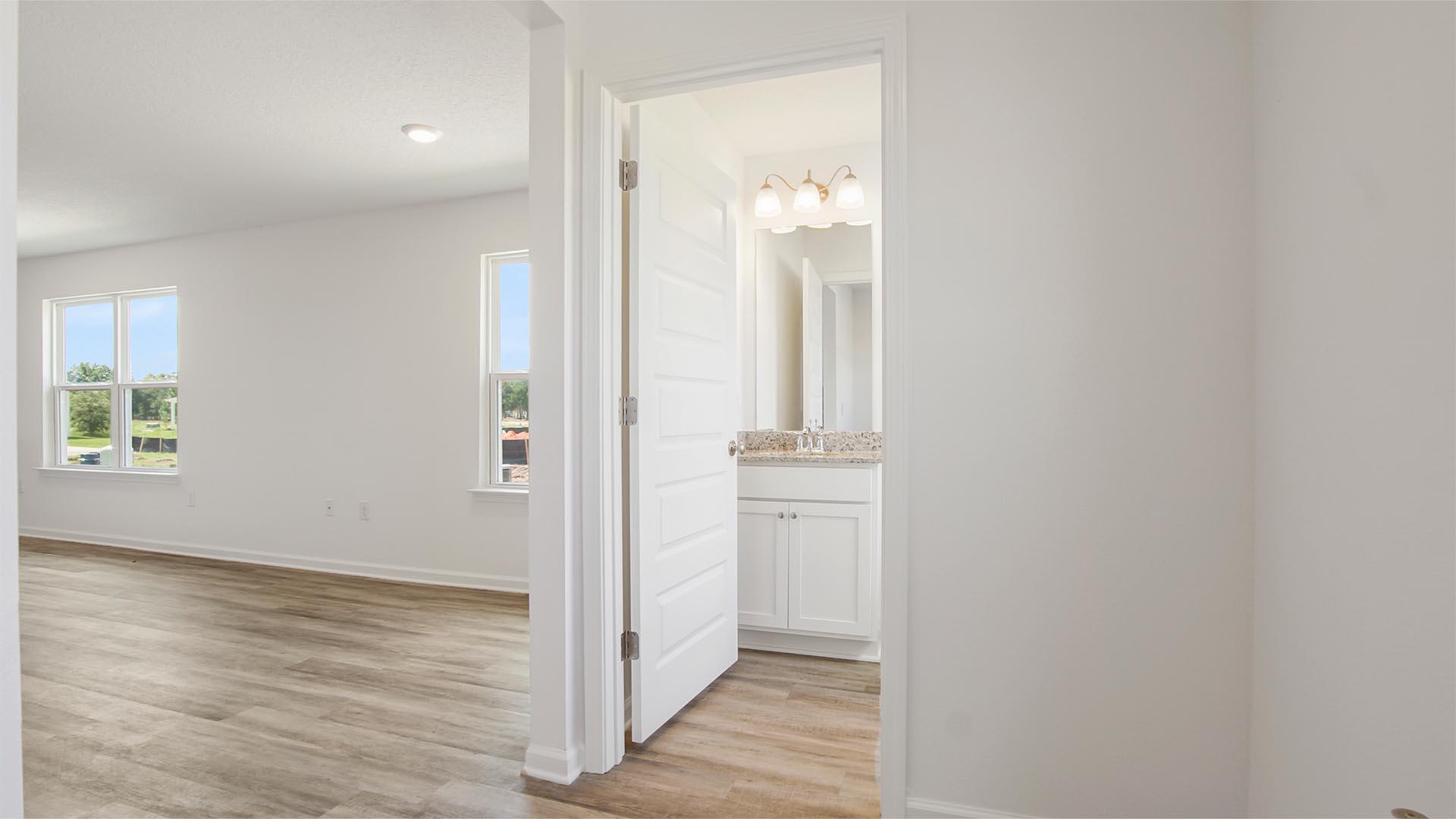 226 Huckleberry Street Freeport, FL 32439 - Photo 4 of 32 wooden floor with white walls