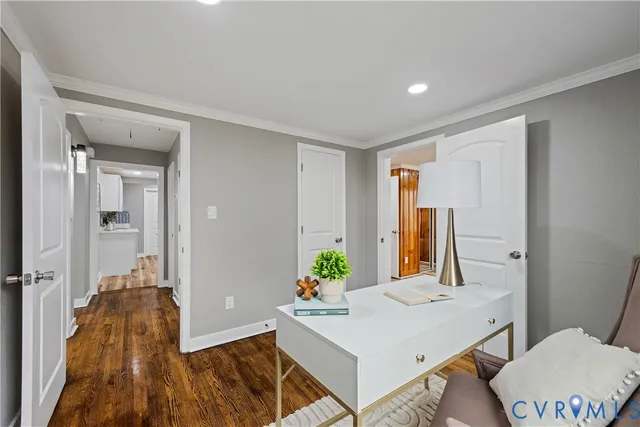 a living room with a bed and a table